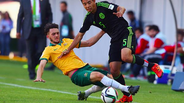 Nicholas Panetta makes a challenge against a Mexican attacker