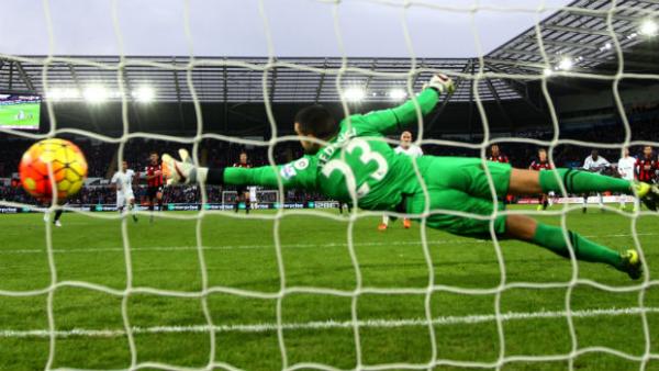 Goalkeeper Adam Federici is beaten from the penalty spot against Swansea City.