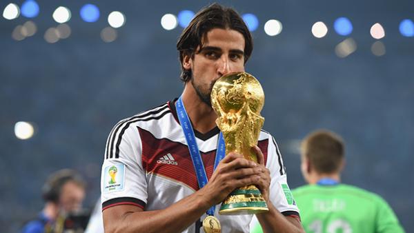 Khedira lifts the World Cup trophy after Germany's victory over Argentina.