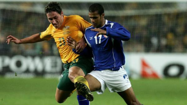 Mark Milligan and Bader Al Mutwa jostle for the ball when the Socceroos played Kuwait in an Asian Cup qualifier in 2006.