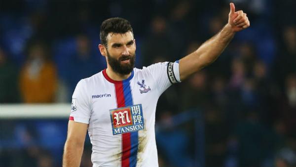 Socceroos skipper Mile Jedinak gives the thumbs up to Crystal Palace's supporters.