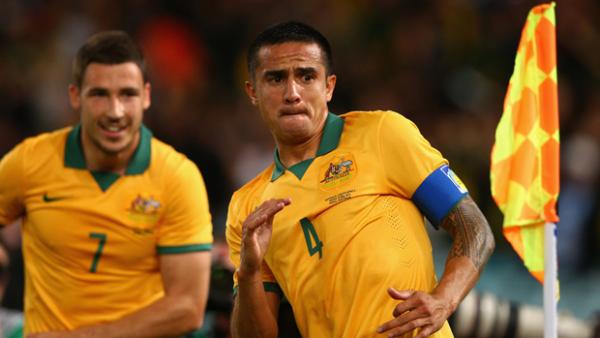Tim Cahill with his trademark goal celebration for the Socceroos.
