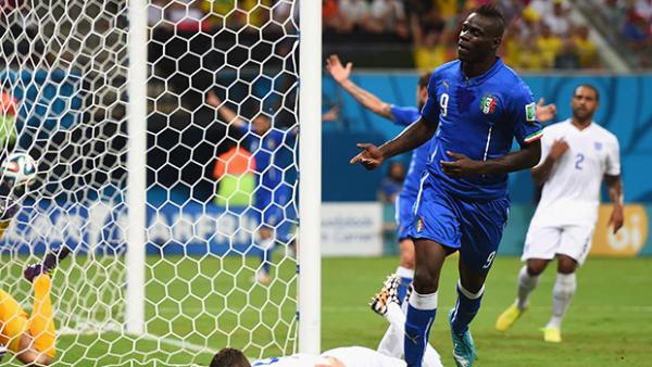 Balotelli celebrates his goal against England in Italy's World Cup opener.