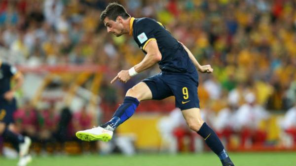 Caltex Socceroos striker Tomi Juric fires a shot at the 2015 Asia Cup.