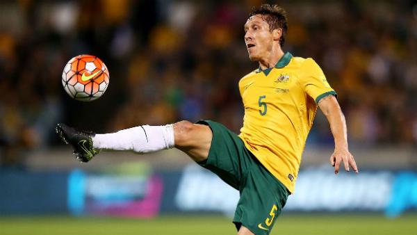 Socceroo Mark Milligan juggles the ball against Kyrgyzstan.