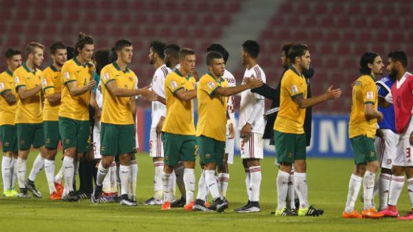 The Olyroos and UAE shake hands at full-time in Doha.