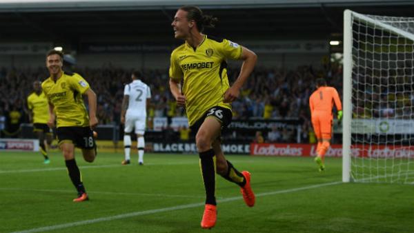 Jackson Irvine celebrates scoring his side's winner against Derby County in the Championship.