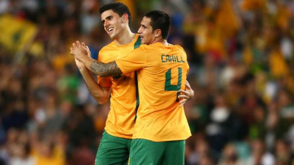 Socceroos Tom Rogic and Tim Cahill.