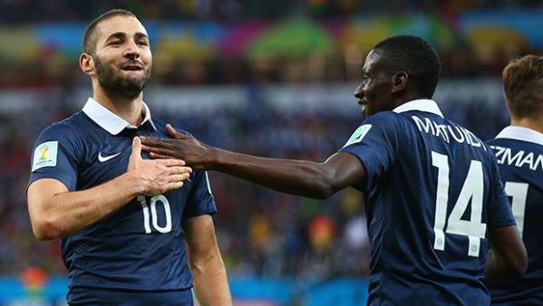 France striker Karim Benzema celebrates after scoring his team's third goal against Honduras.