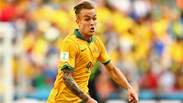 Adam Taggart in action for the Socceroos at the 2014 FIFA World Cup.