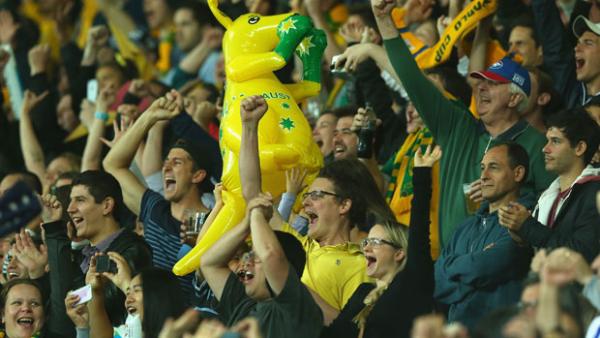 Socceroos fans celebrating a goal