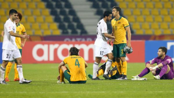 A disappointed Olyroos side shake hands with Jordan at full-time at the AFC U-23 Championship.