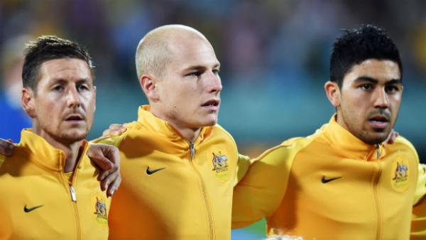 Caltex Socceroos Nathan Burns, Aaron Mooy and Massimo Luongo before kick-off against Tajikistan in Adelaide.