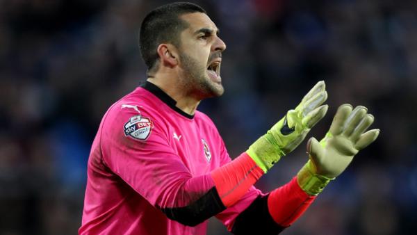 Adam Federici in action for Reading FC.