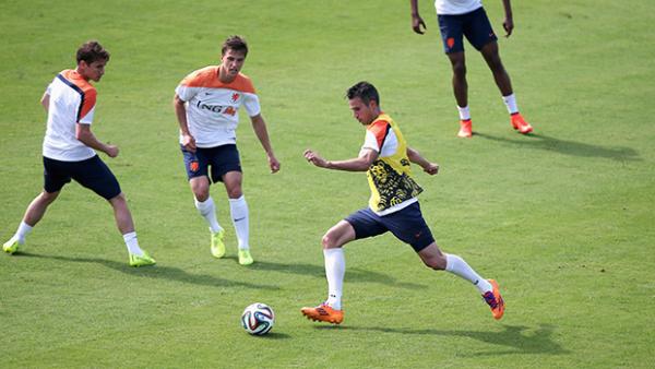 Van Persie shoots during a Netherlands training session in Rio de Janeiro, Brazil