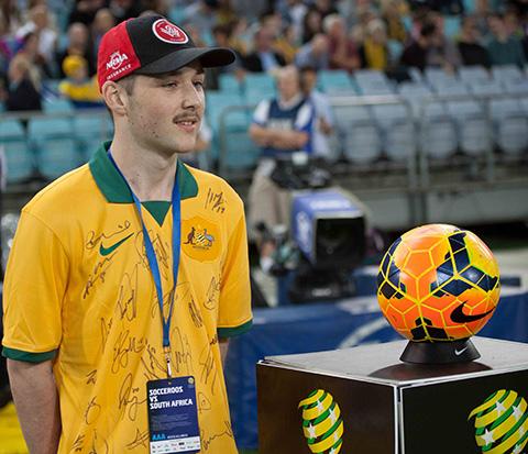 Josh Allen prior to presenting the match officials with the game ball for the Socceroos v South Africa match.