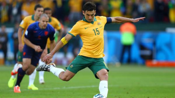Socceroos captain Mile Jedinak converts from the penalty spot against the Netherlands at the World Cup.