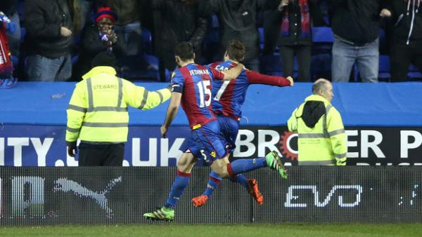Mile Jedinak celebrates with Yohan Cabaye after the latter opened the scoring against Reading.