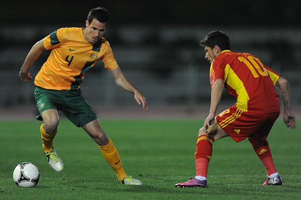 Socceroo Ryan McGowan controls possession in last year's friendly against Romania.