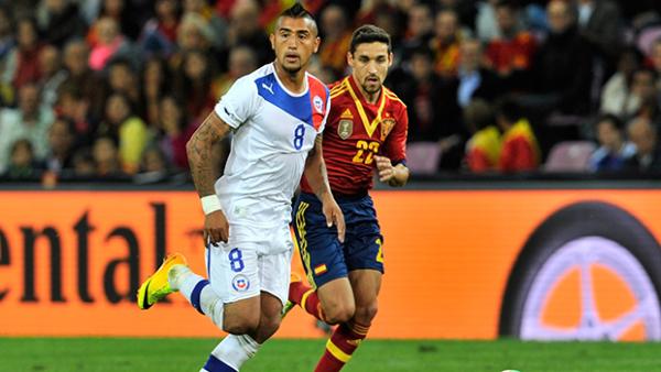 Chile's Arturo Vidal controls possession against Spain during a friendly last year.