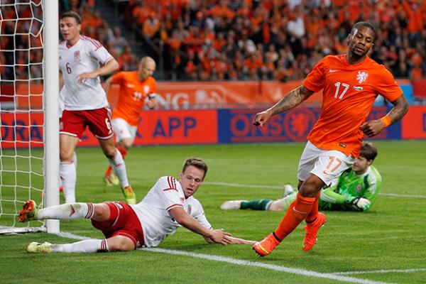 Dutchman Jeremain Lens celebrates after scoring the second goal in win over Wales.