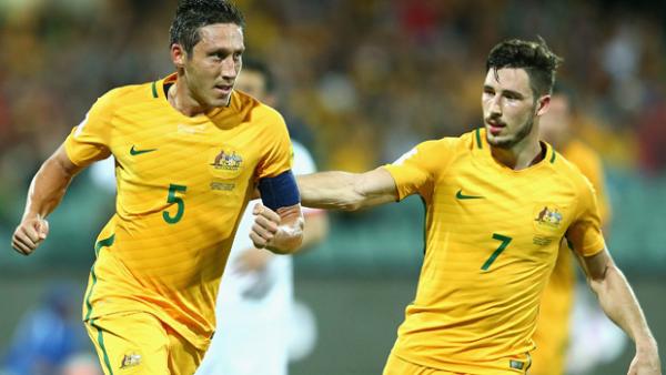 Mark Milligan celebrates a goal against Tajikistan in World Cup Qualifying.