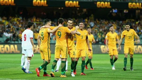 The Caltex Socceroos celebrate their fifth goal against Tajikistan at the Adelaide Oval.