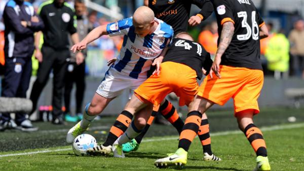 Aaron Mooy on the ball in Huddersfield's 0-0 draw with Sheffield Wednesday.