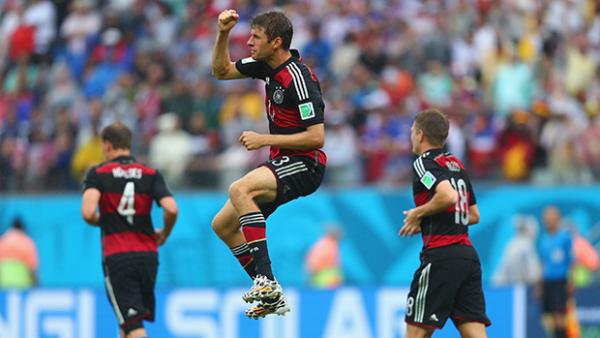 Thomas Muller celebrates scoring the decisive goal in Germany's win over the United States.