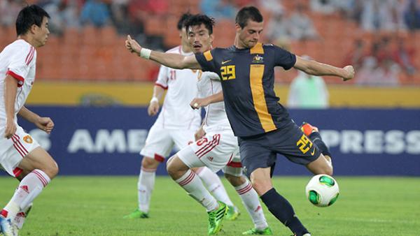 Tomi Juric in action for the Socceroos against China.