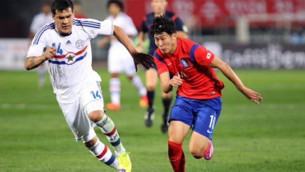 Korea Republic's Heung-Min Son on the ball against Paraguay.