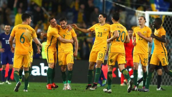 The Caltex Socceroos players celebrate a goal in the recent friendly win over Greece in Sydney.