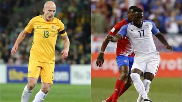 Caltex Socceroos midfielder Aaron Mooy and USA striker Jozy Altidore.