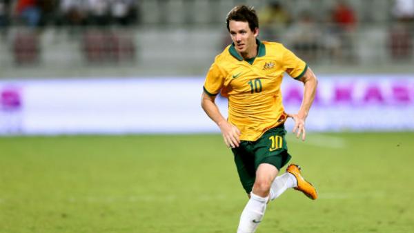 Robbie Kruse on the ball in October's friendly against Qatar.