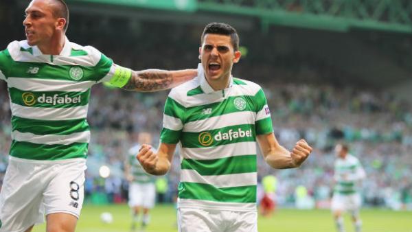 Celtic's Tom Rogic celebrates scoring against Hapoel Be’er Sheva in the first leg of their UEFA Champions League play-off.