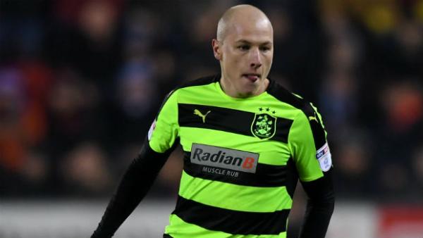 Aaron Mooy in action for Huddersfield Town in the Championship.