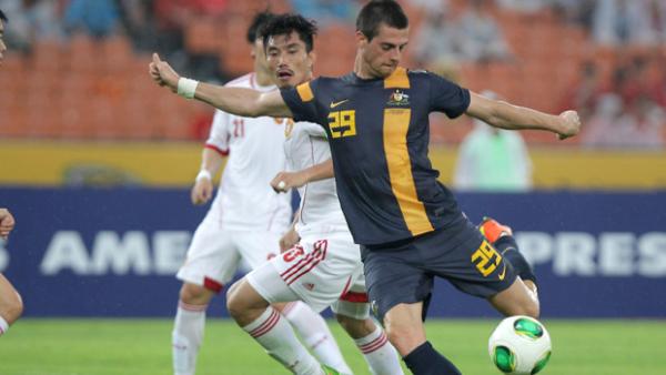 Socceroos striker Tomi Juric shoots on goal against China at the 2013 East Asian Cup.
