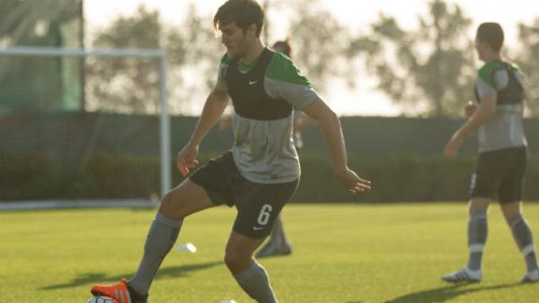Josh Brillante takes part in a training drill at Olyroos training in Doha.