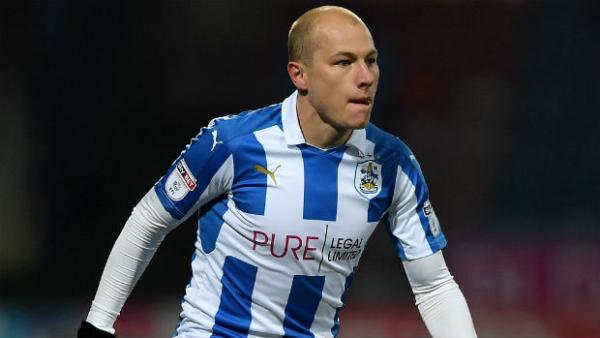 Aaron Mooy on the ball for Huddersfield Town in the Championship.