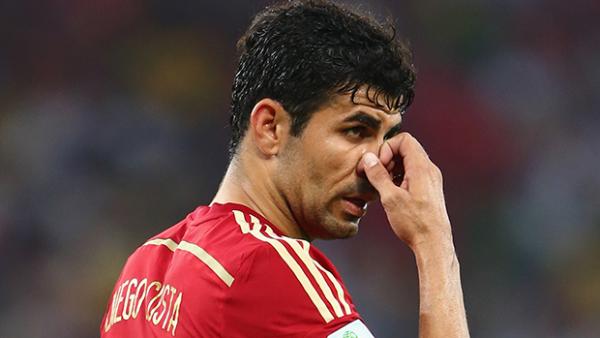Costa looks on during Spain's loss to Chile in Brazil.