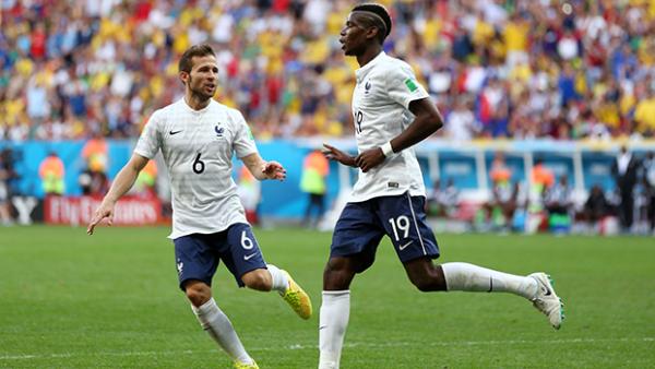 Pogba celebrates after opening the scoring for France against Nigeria at the World Cup in Brazil.