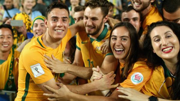 Caltex Socceroos youngster Chris Ikonomidis with fans in Sydney.