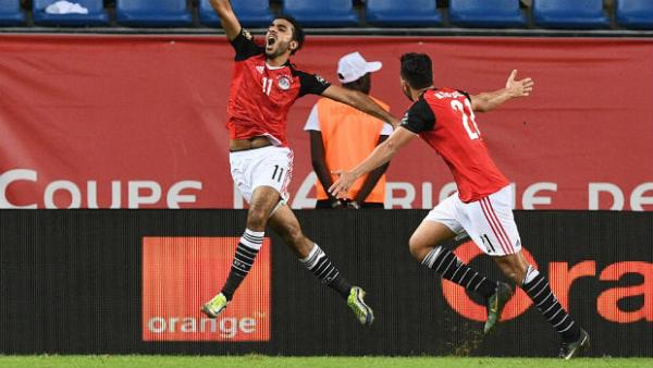Egypt's Mahmoud Abdel-Moneim celebrates scoring a late winner against Morocco at the Africa Cup of Nations.