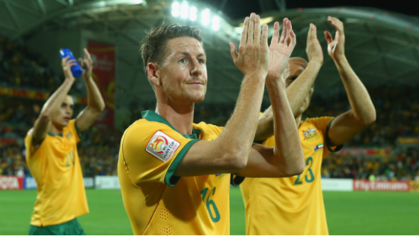 Nathan Burns applauds the Melbourne crowd following the Socceroos win over Kuwait.