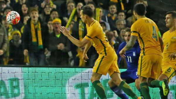 Trent Sainsbury scores against Greece the last time the Caltex Socceroos played in Melbourne.