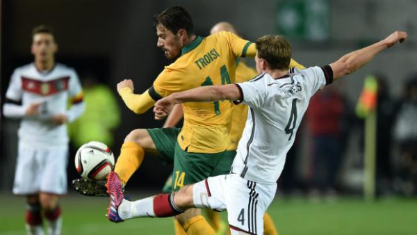 James Troisi wins the ball in the Socceroos' draw with Germany.