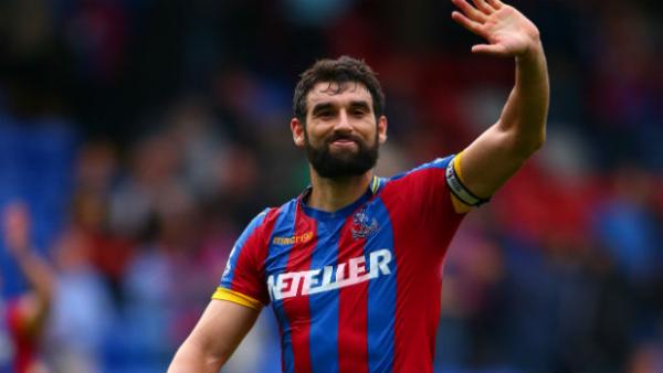 Mile Jedinak waves to Crystal Palace fans following a win in the EPL.