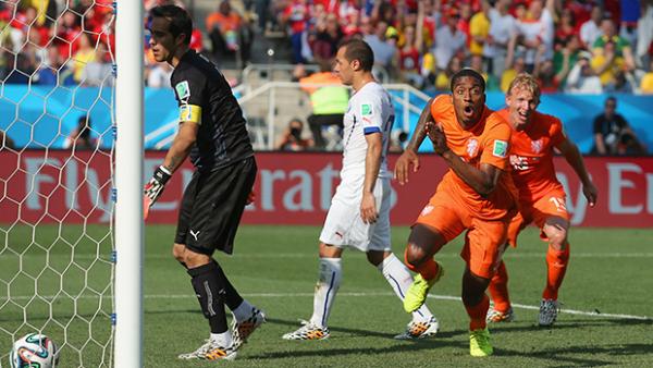 Netherlands' Leroy Fer celebrates netting the match opener against Chile.