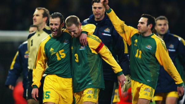 Socceroos players celebrate their 3-1 win over England at Upton Park.