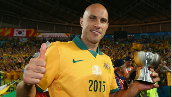 Mark Bresciano celebrates the Socceroos' Asian Cup triumph.